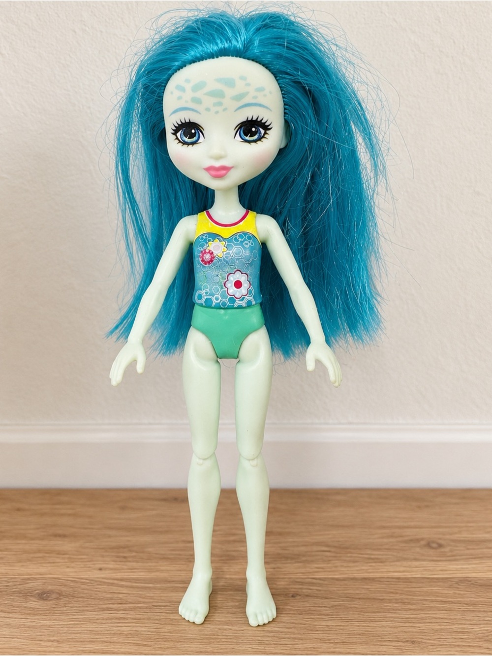 Mattel Blue-Teal Fashion Doll with Floral Swimsuit